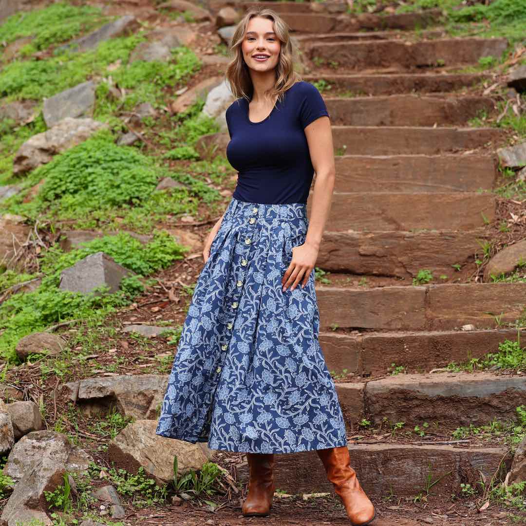woman in white cotton maxi skirt