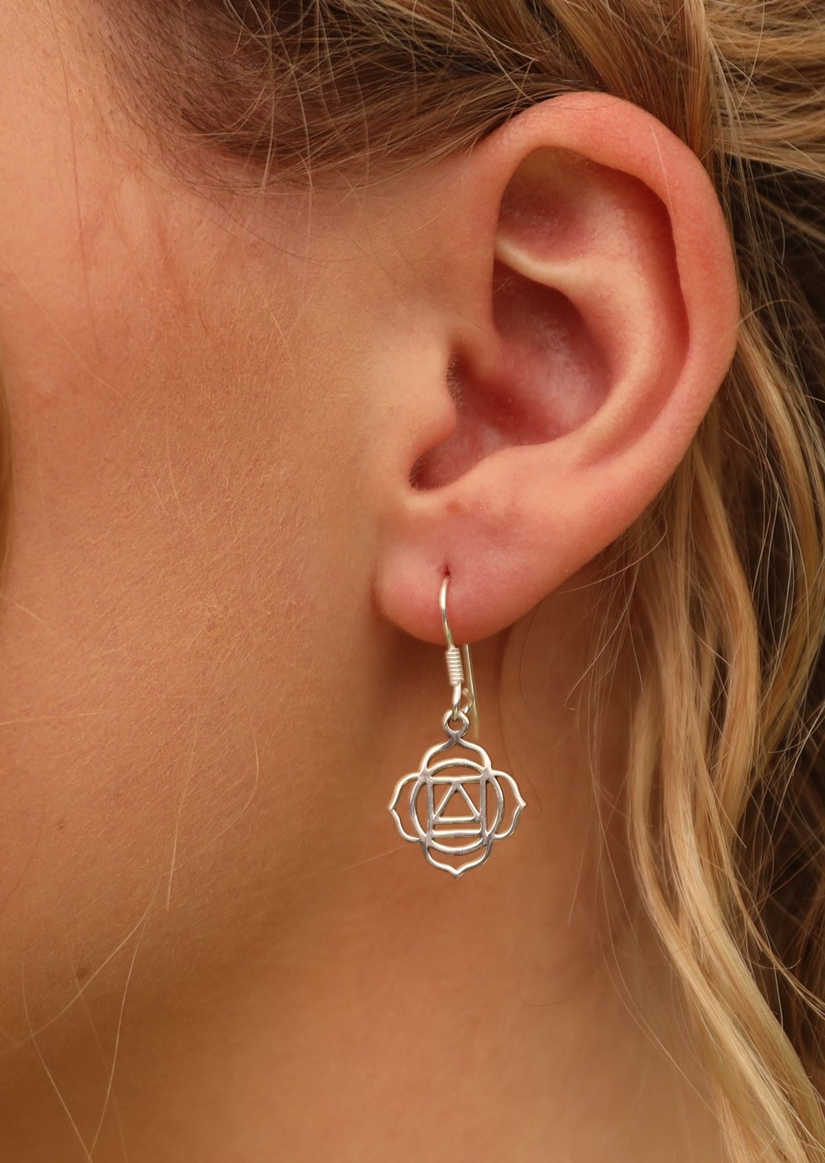 92.5% silver dangly chakra earrings on woman with blonde hair