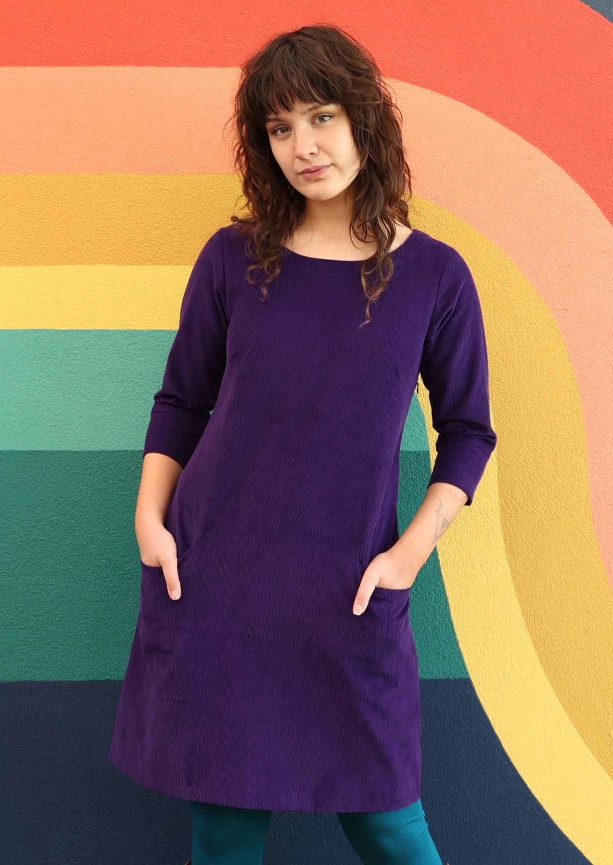 Bright purple corduroy dress with 3/4 sleeves with detailed cuff