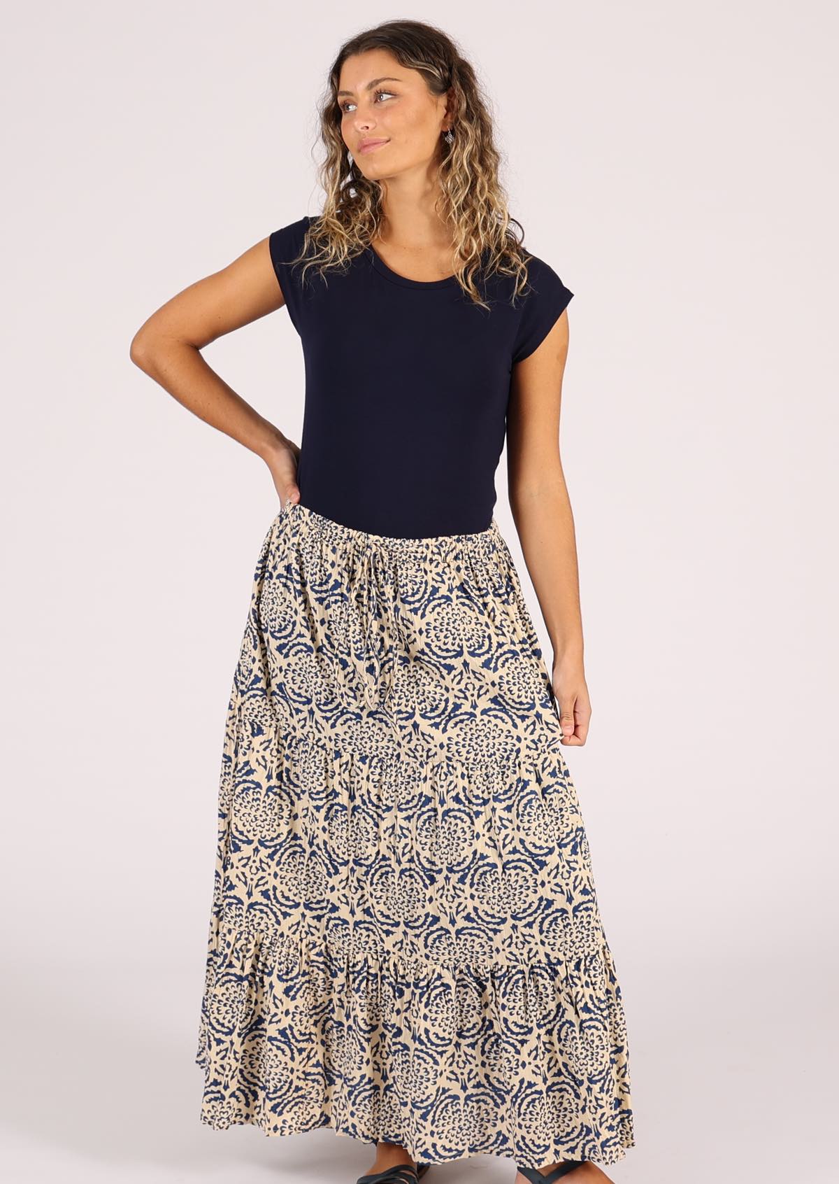Model wears cotton maxi skirt with drawstring and elasticised waistband