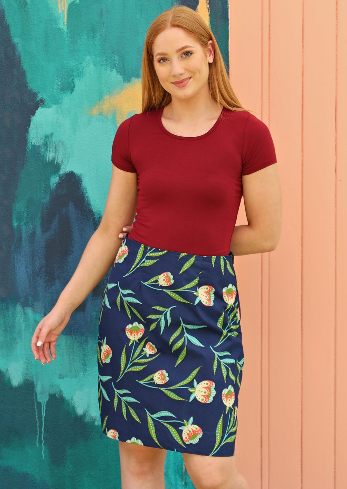 Model wears floral print on blue base cotton reversible skirt
