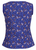 Tailored 100% cotton top features a blue base and a floral daisy print. 