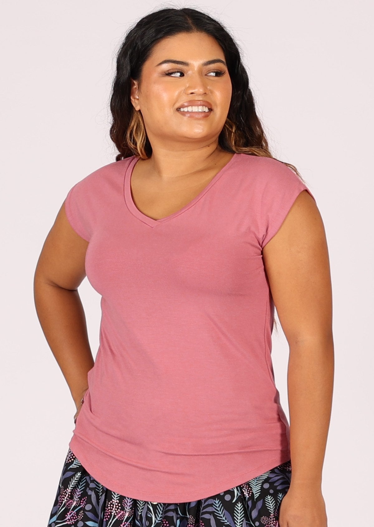 Pink cap sleeved soft stretch rayon top with V-neckline