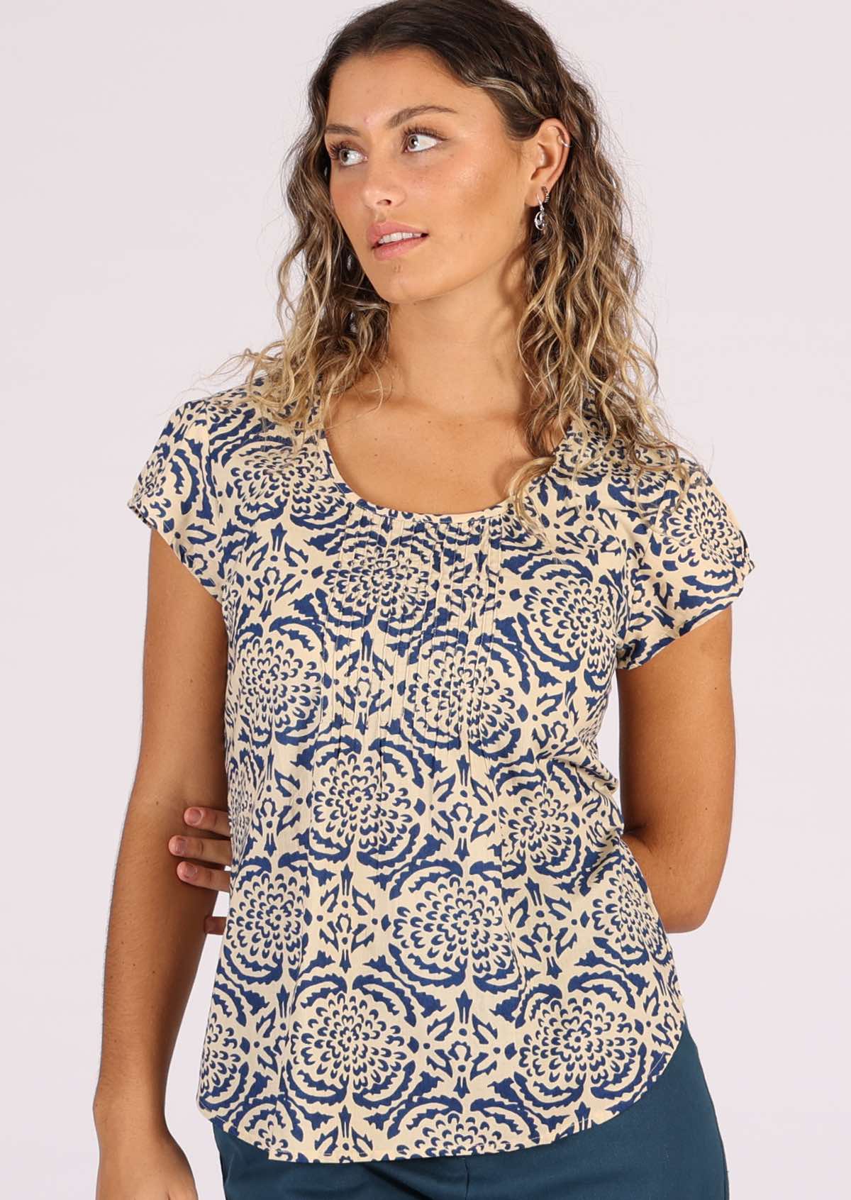 Blue Dahlia stamped look print on cream base cotton top