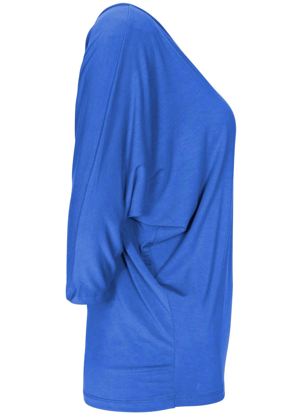 Side view of women's 3/4 sleeve rayon batwing v-neck blue top.