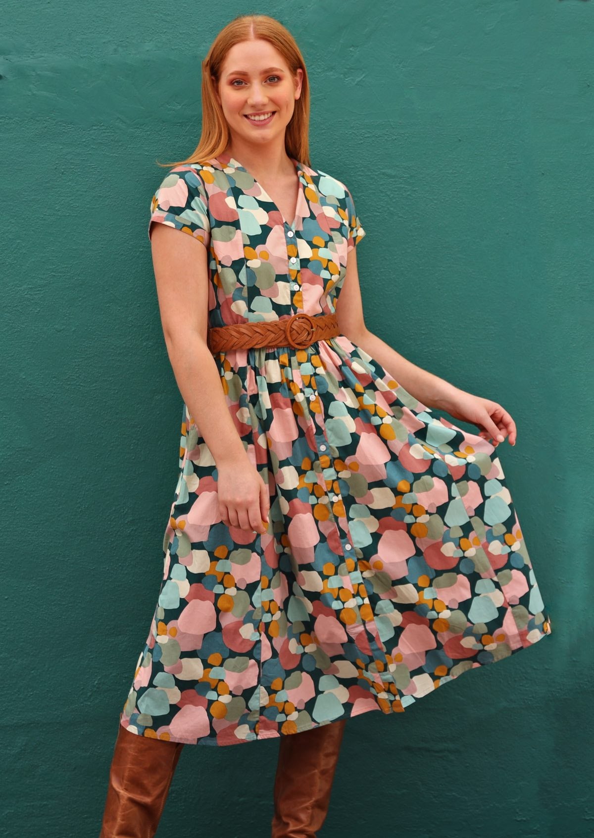 Pink and teal printed cotton women's dress with pockets and high round neckline that can be folded to form V neck