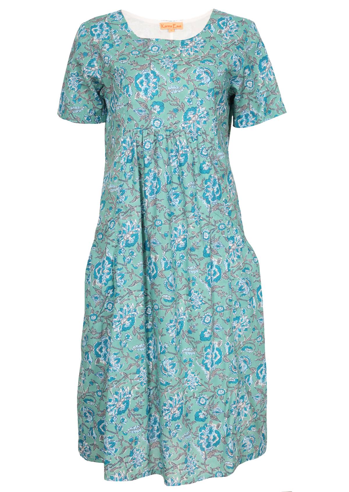 100% cotton loose dress with short sleeves, pockets and gathers under the bust.