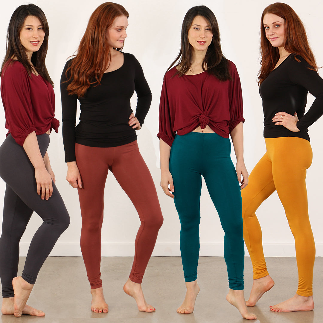 women wearing coloured leggings, blue leggings, yellow leggings, pink leggings, grey leggings 