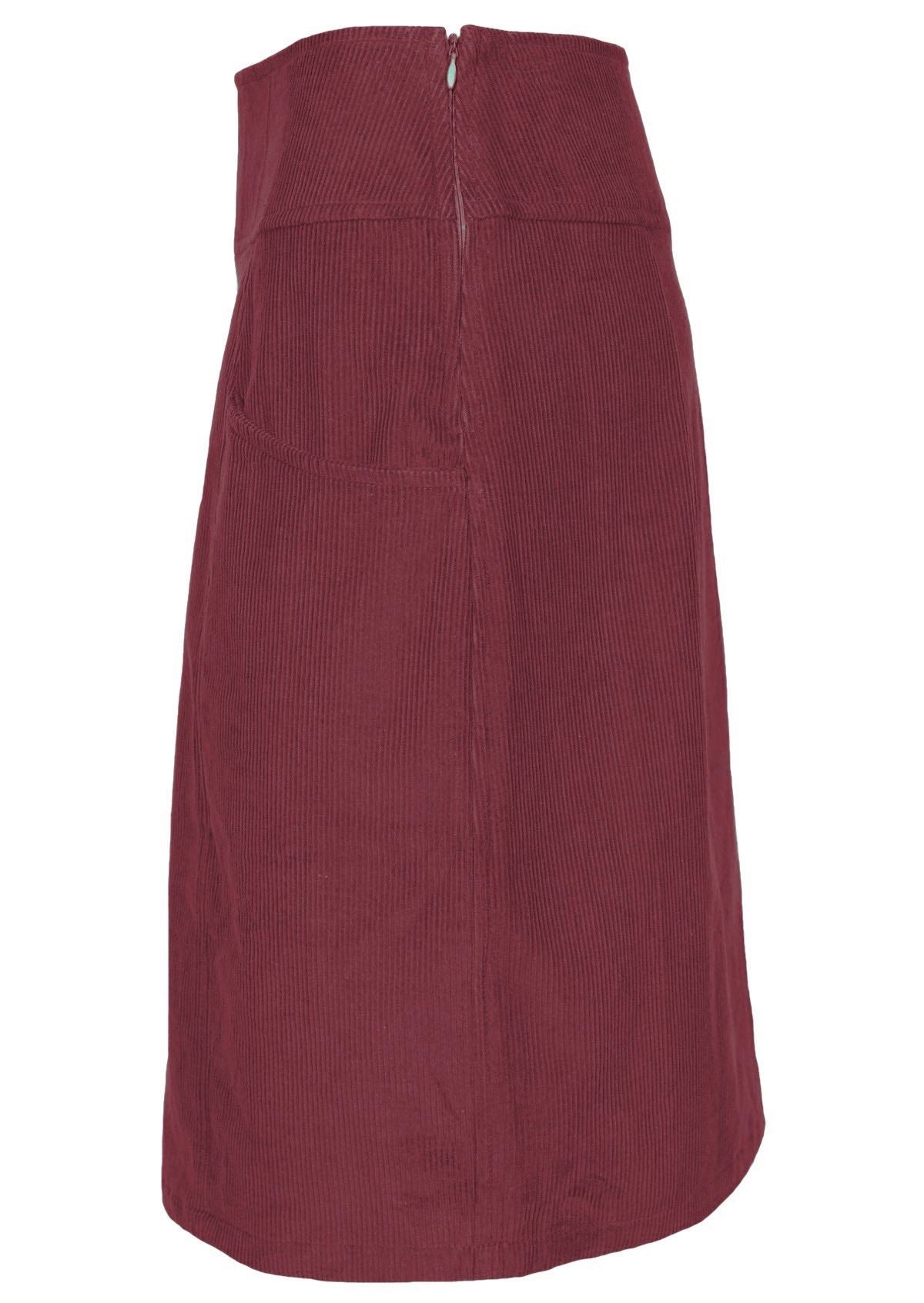 Red corduroy skirt is made out of 100% cotton and features a hidden side zip. 