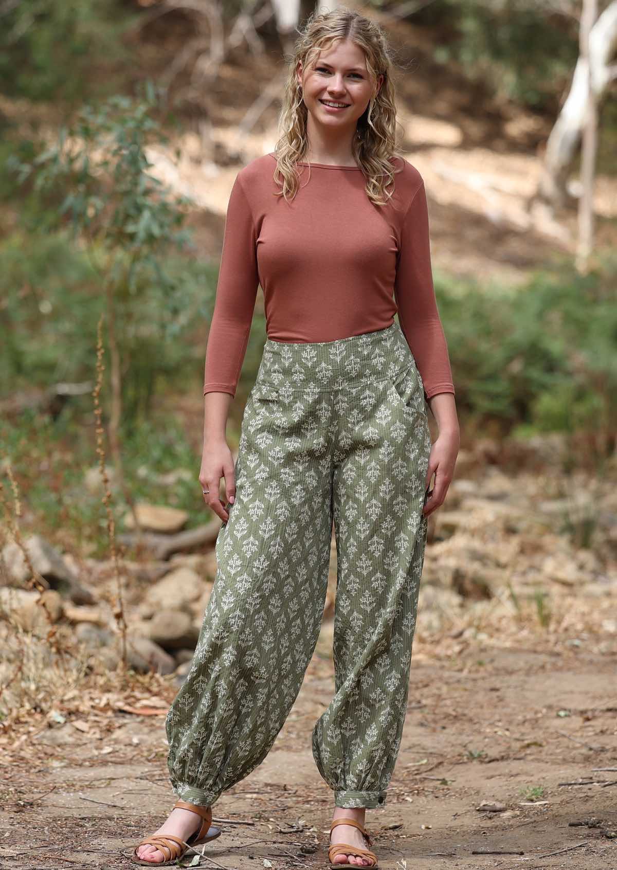 Cotton harem pants with buttoned ankle cuff and pockets