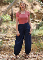 Cotton genie pants with cuffed ankles with button closure
