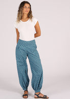 Cotton harem pants with cuffed ankles and pockets