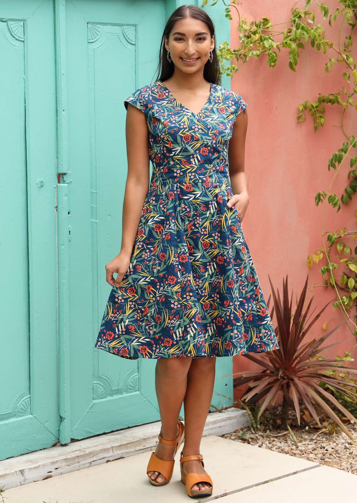 Model pairs 100% cotton dress with sandals. 