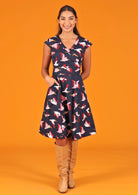 Woman wearing  retro style cotton dress with pockets