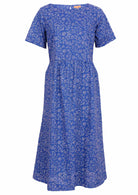 Cotton short sleeve dress with white florals on a blue base. 