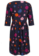 100% cotton navy blue, long sleeve dress with pockets and high round neckline.