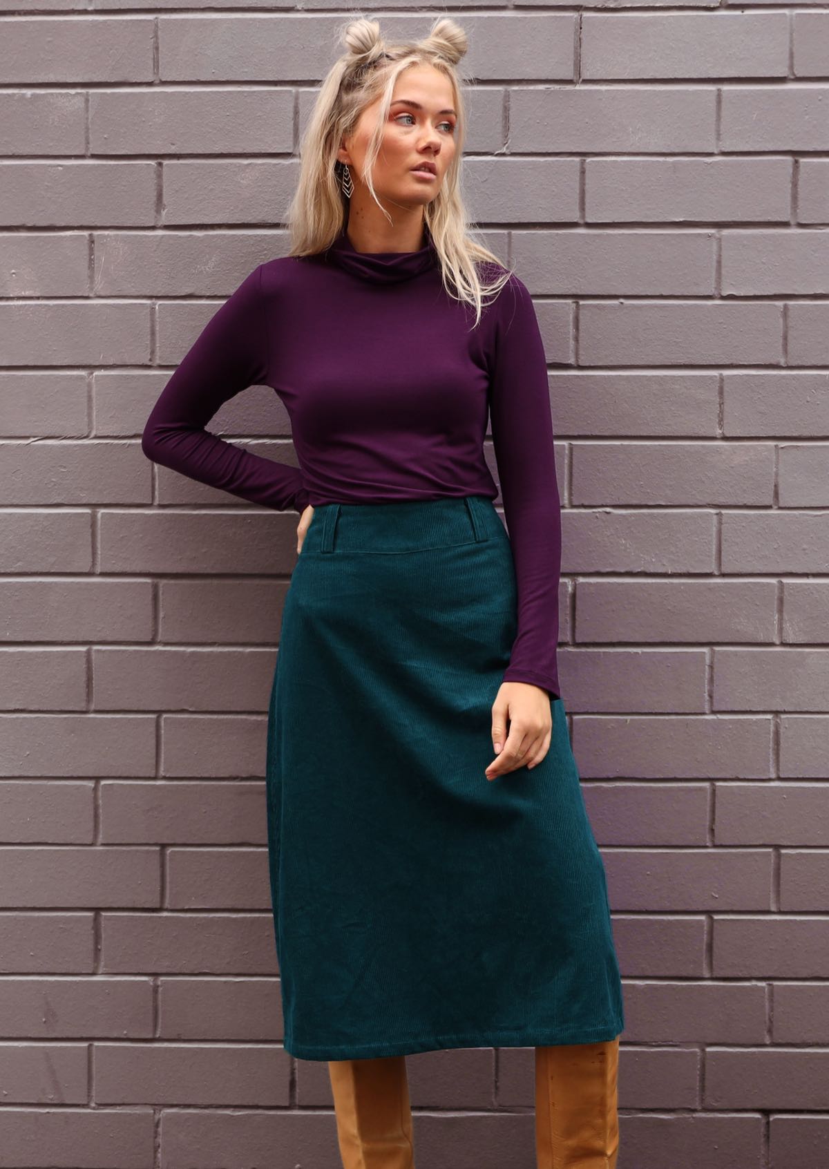 A-line shin length corduroy skirt with belt loops and back pockets