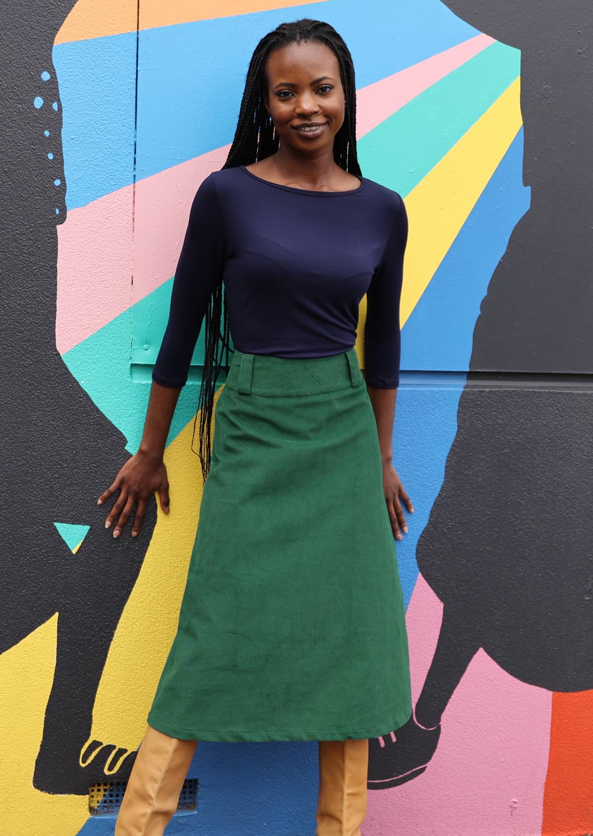 A-line midi length corduroy skirt in lush green with side zip