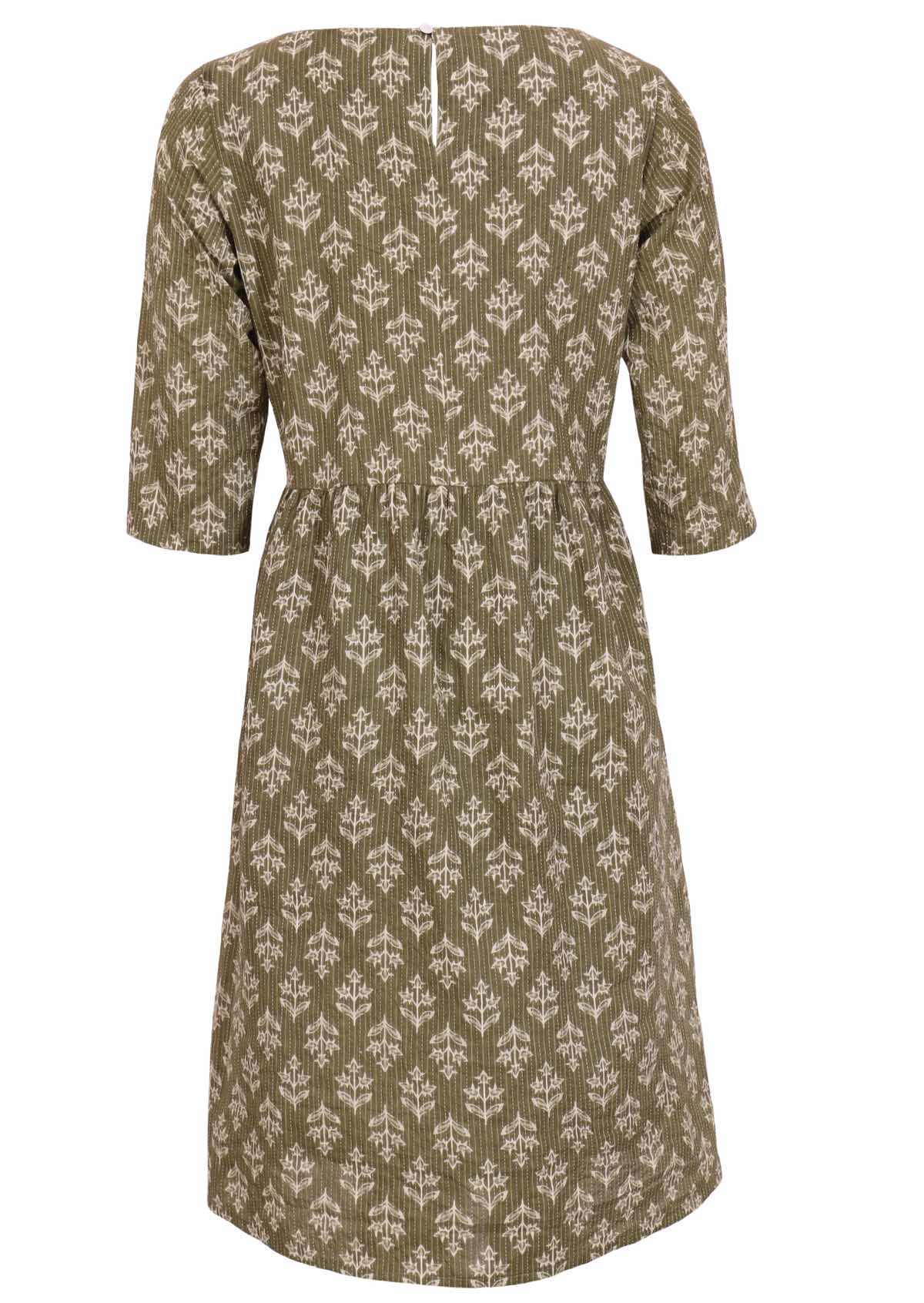 Cotton dress in sweet green has button closure at nape of neck to ease with dressing