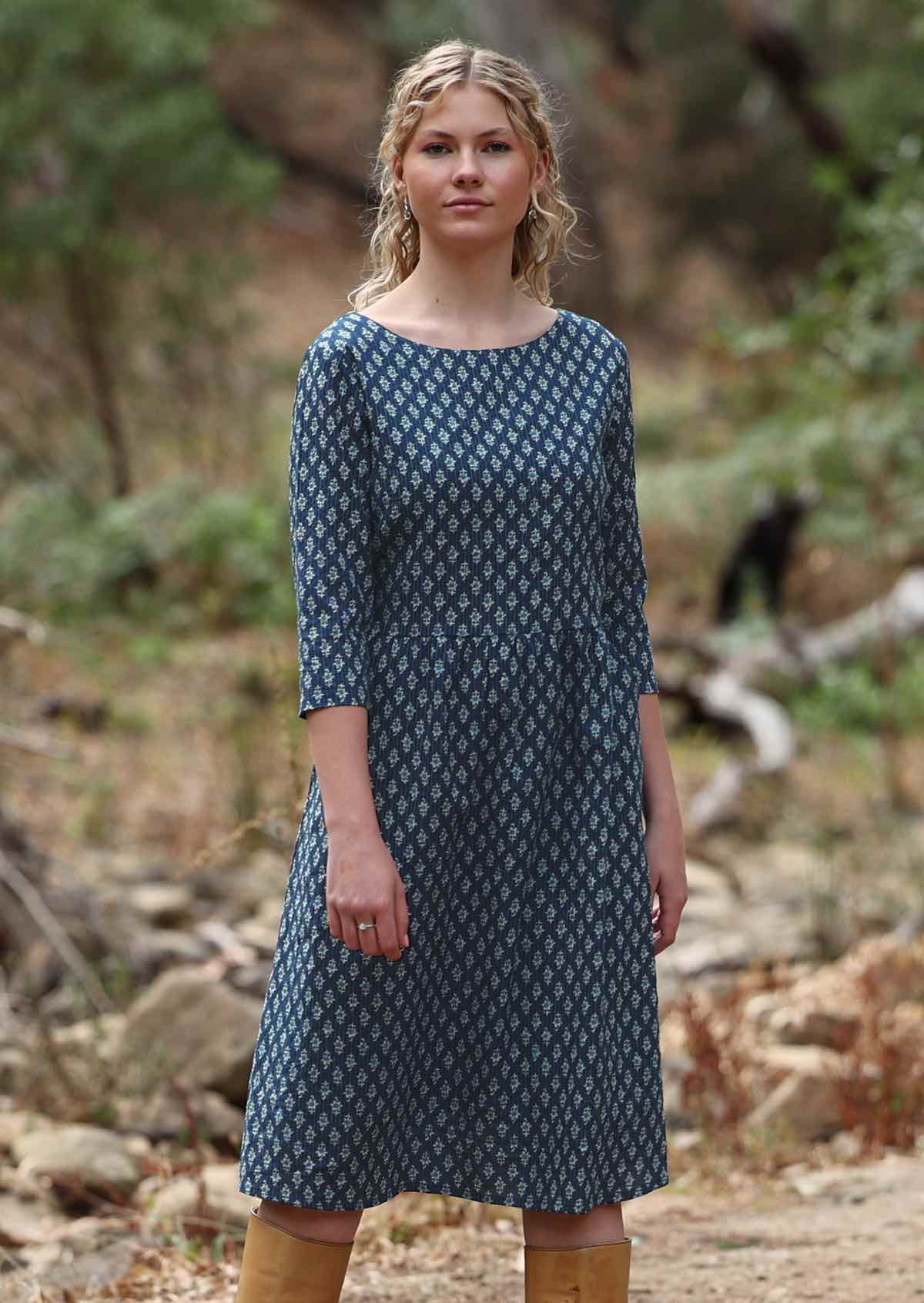 Knee length cotton dress with wide round neckline and lining