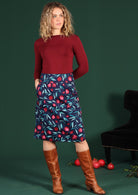 Woman wears 100% cotton skirt with hidden side zip