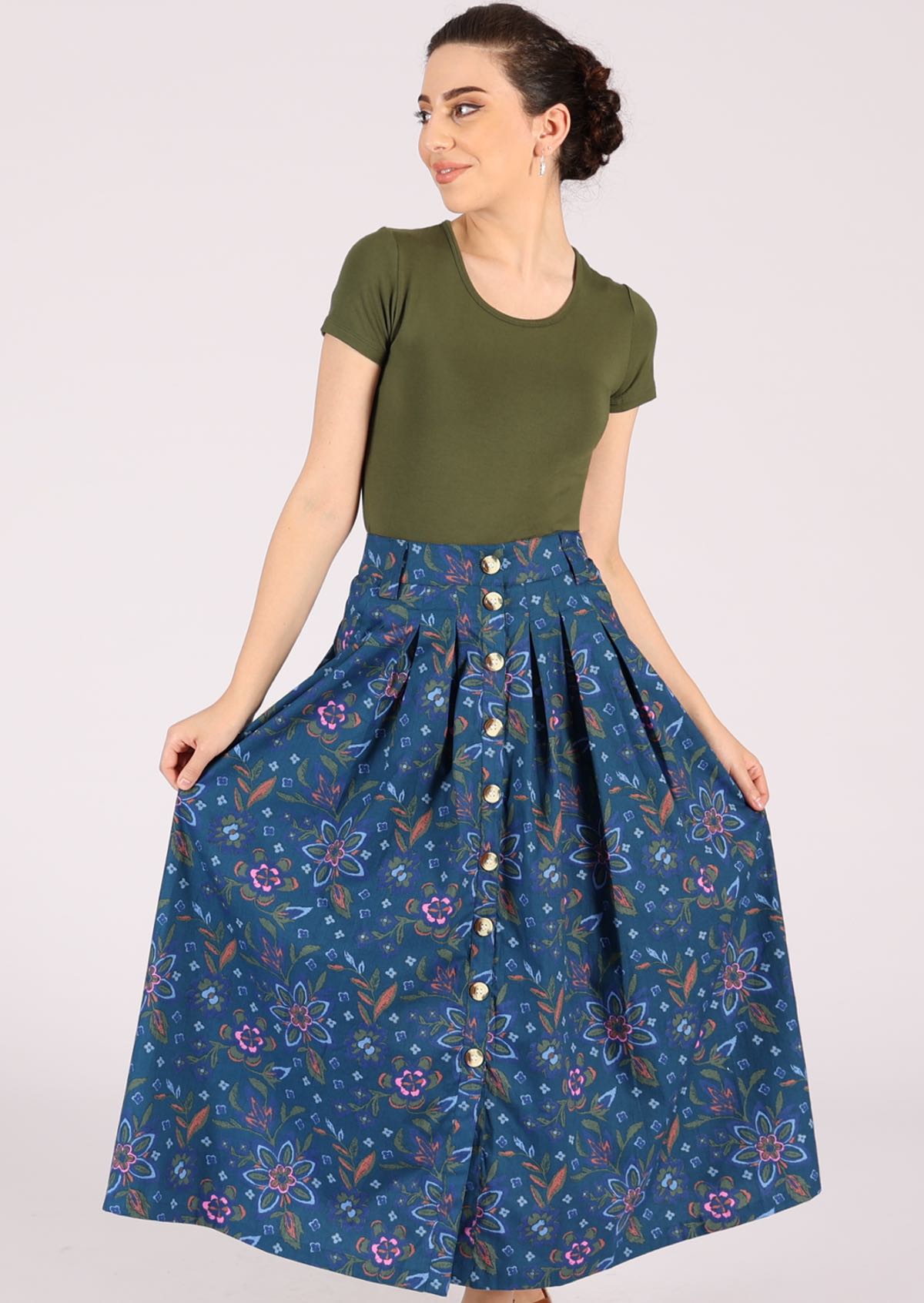 Blue midi skirt features buttons running down the front. 