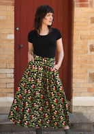 Model wears green and black print cotton midi skirt
