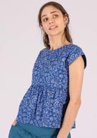 Cotton blue base floral top with large ruffle