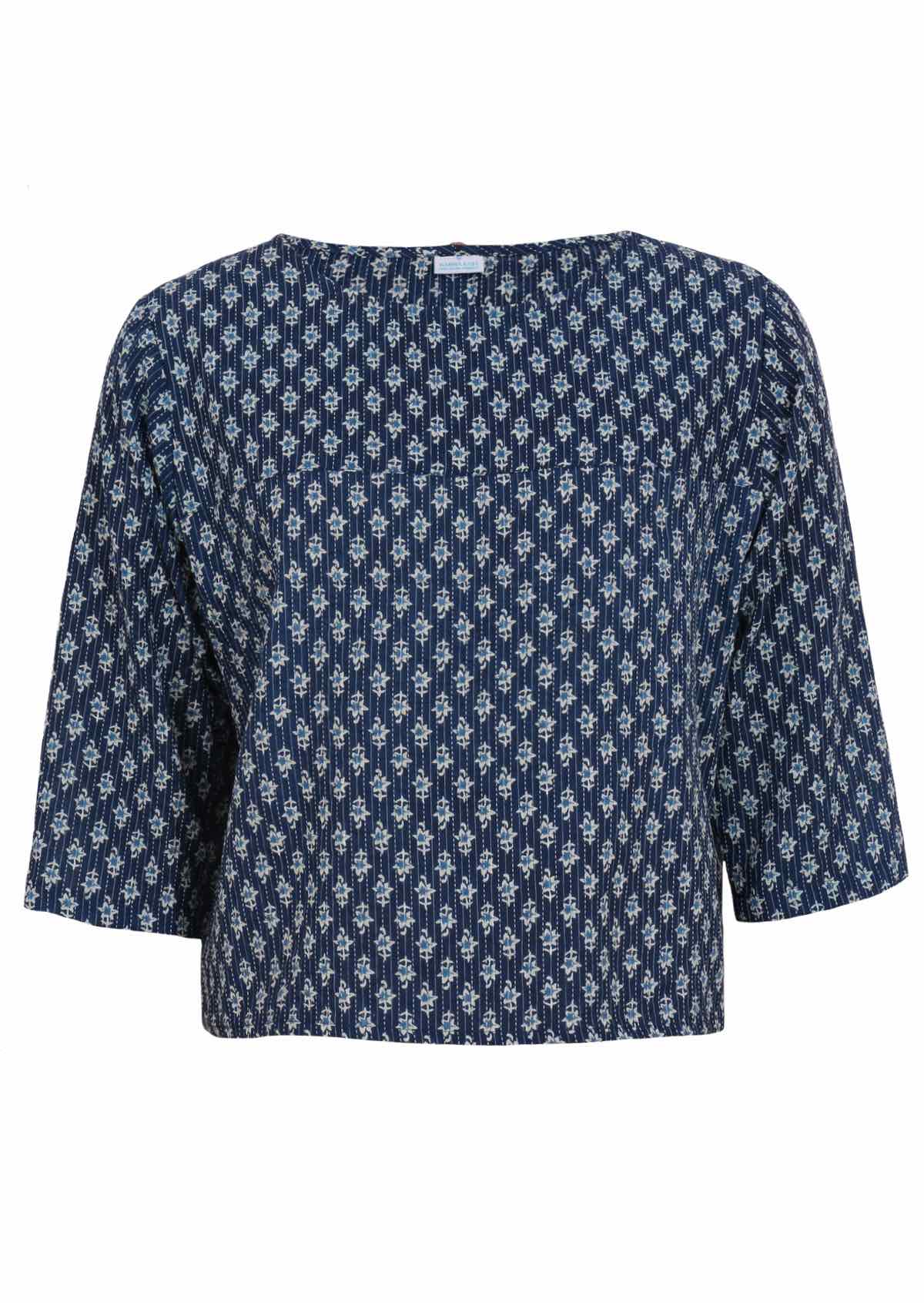 Blue floral top features a seam across the bust. 