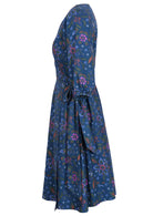 Cotton wrap dress has a wide waist tie fastened at the side. 