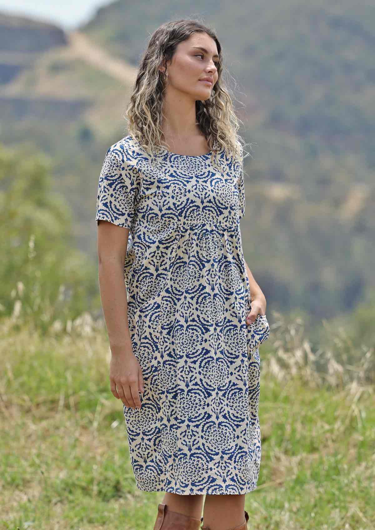Model wears a fully lined, loose fitting dress. 