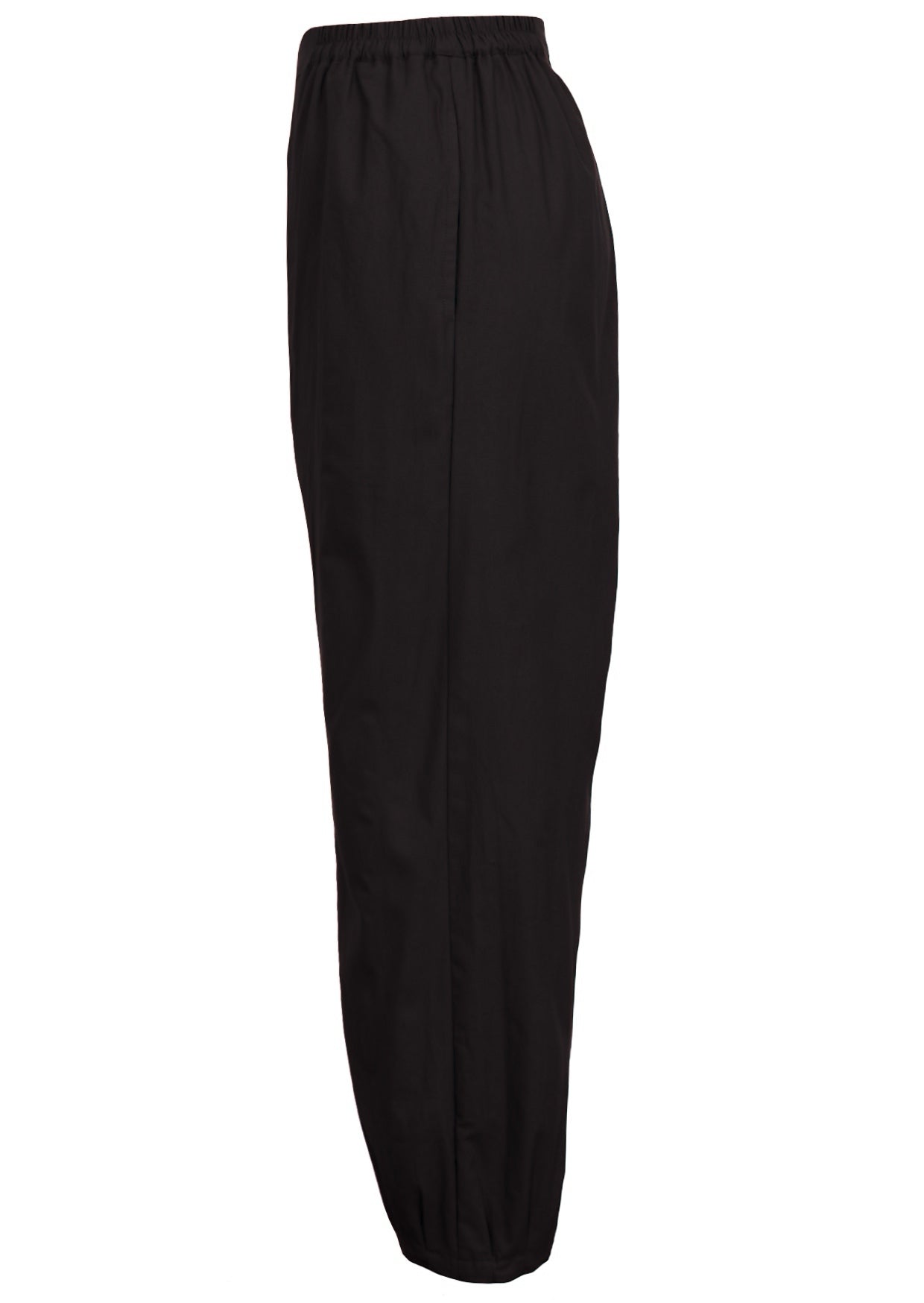 Side view of wide leg black cotton pants with elastic waist, pockets and pleated ankles 