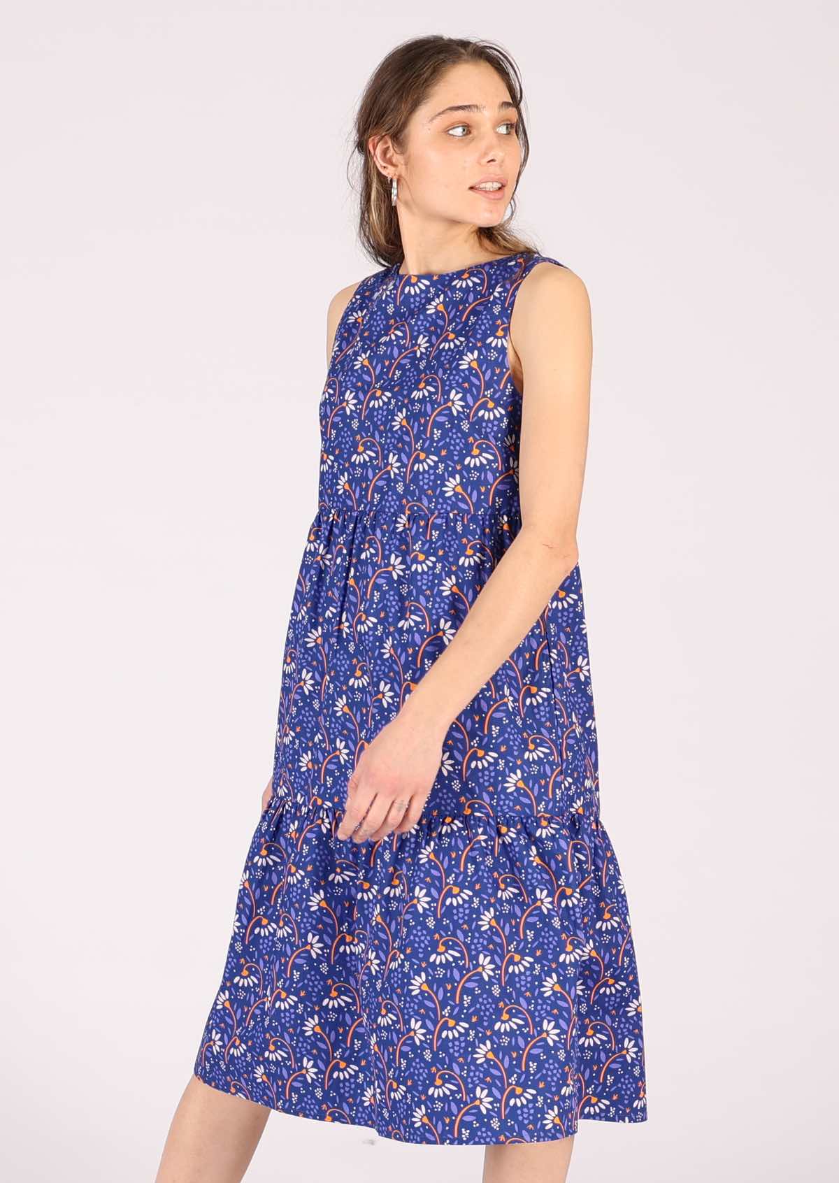 Shin length sleeveless cotton dress with fun daisy print