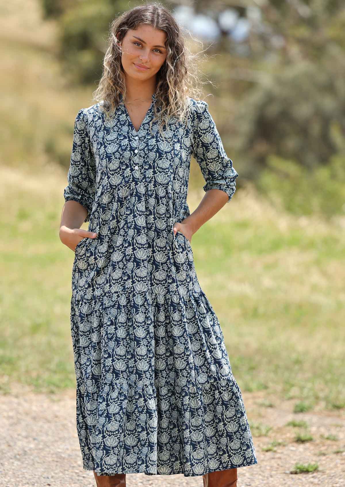 woman with hill in background wearing block print cotton maxi dress in Indigo 