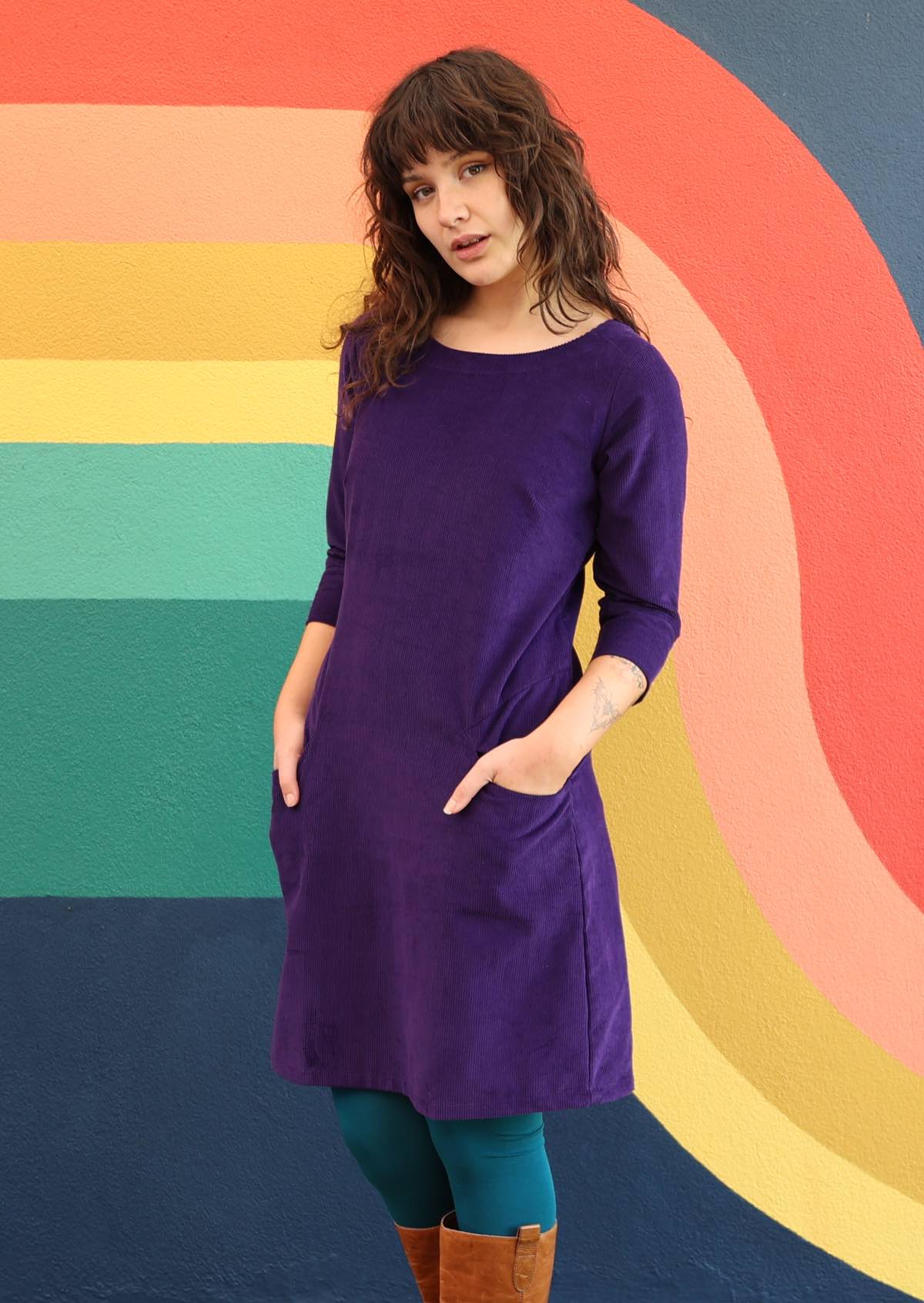 Corduroy dress in rich purple with pockets and side zip