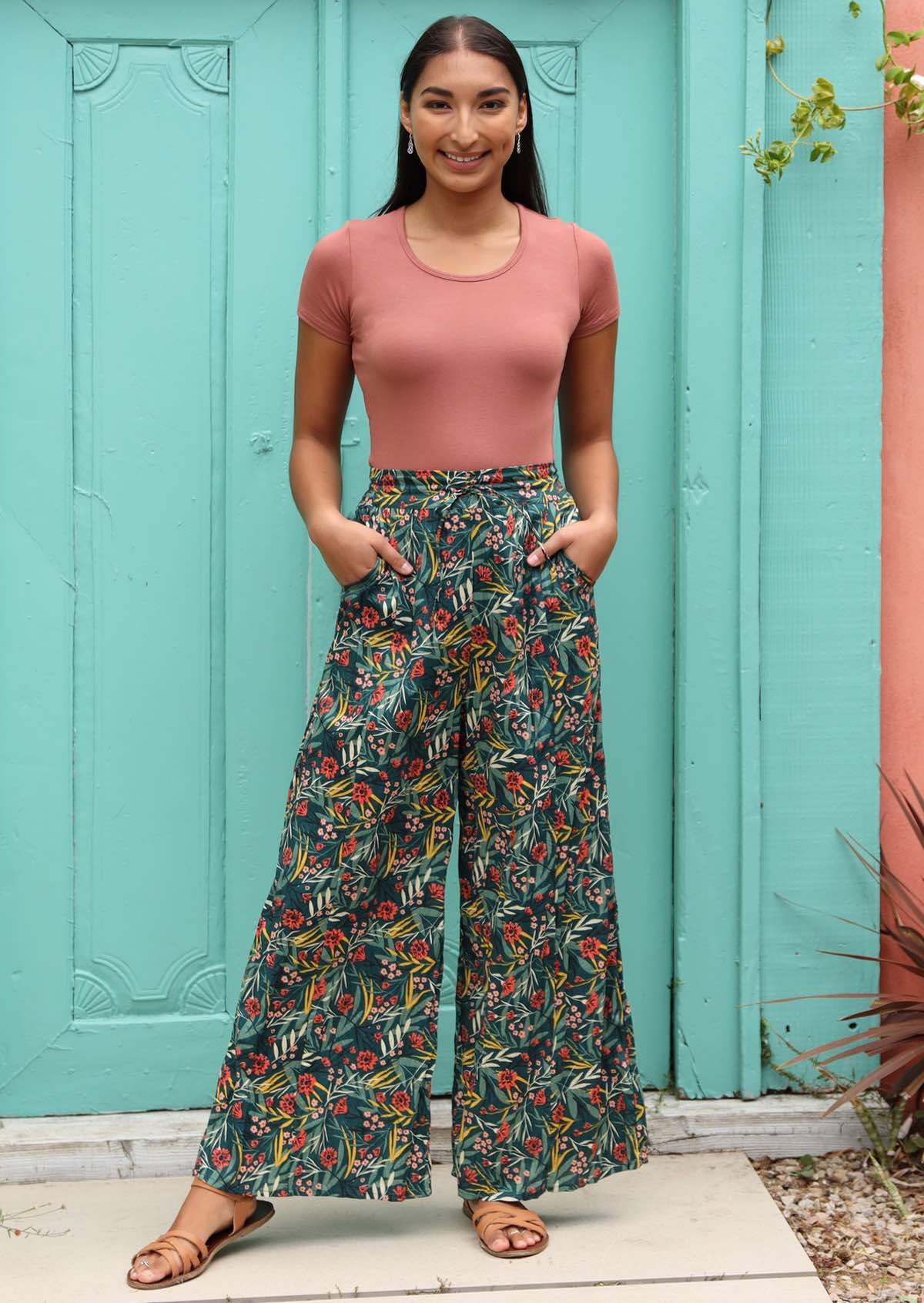 Model wears 100% cotton floral pants. 