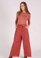 Lightweight cotton wide leg pants with burnt red base