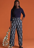 Model in Janis Pants Delphi navy blue wide legged women's cotton pants and long sleeve navy stretch top