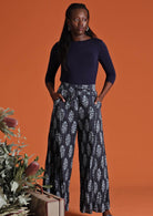 Model in Janis Pants Delphi navy blue wide legged palazzo women's cotton pants and long sleeve navy stretch top