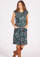 100% cotton dress with high round neck, raglan cap sleeves, and slight A-line skirt