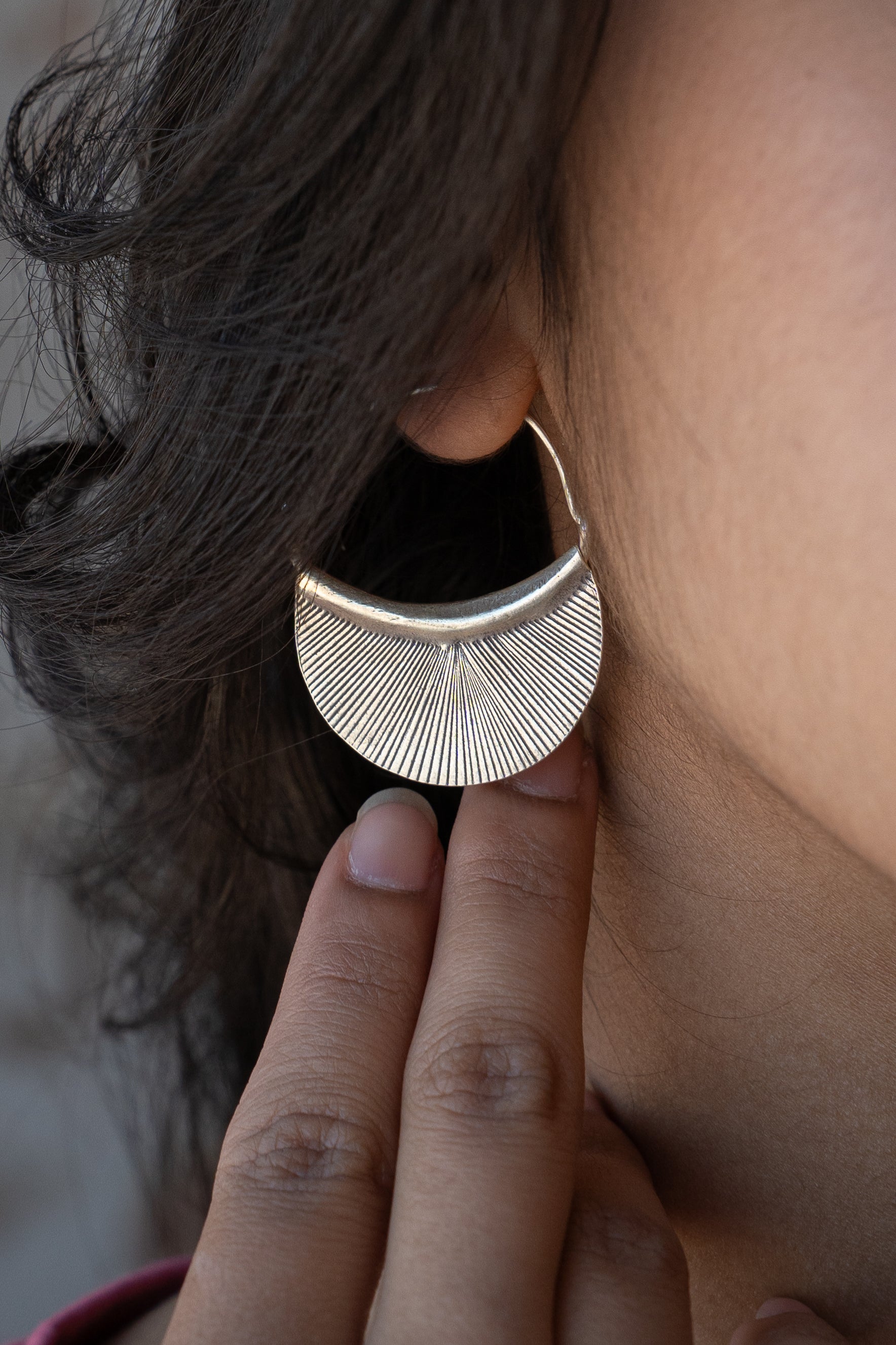 Woman wearing Hill Tribe Silver hoop earring 