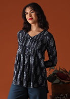 Navy blue Indian block print cotton blouse on model with dark 