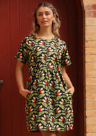Model wearing cotton botanical print relaxed fit dress