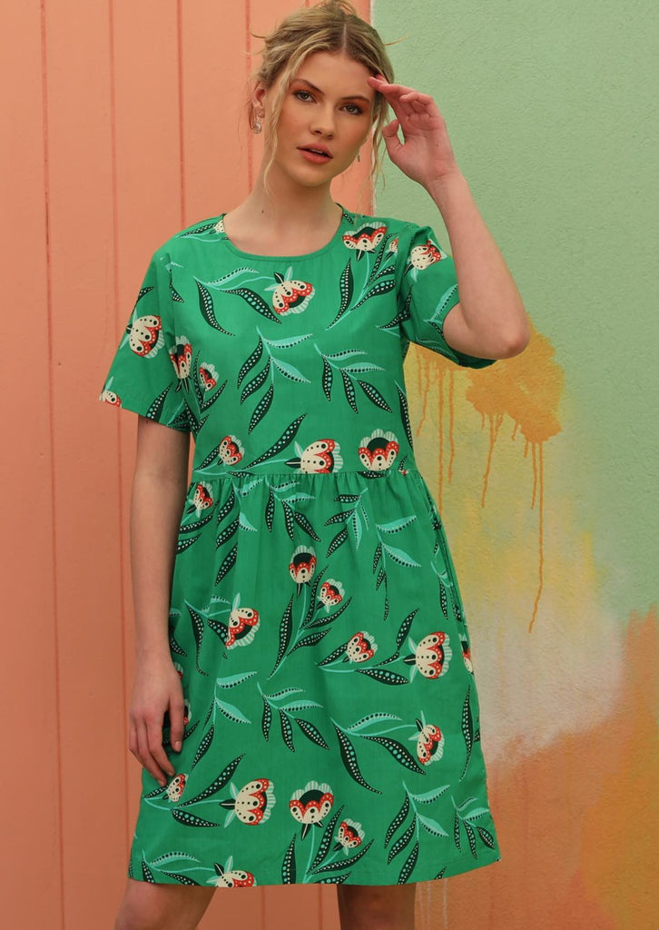 Model wears a 100% cotton dress. 
