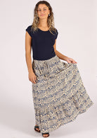 Flowy cotton maxi skirt with blue floral print on cream base