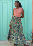 Model wears a 100% cotton, tiered maxi skirt. 