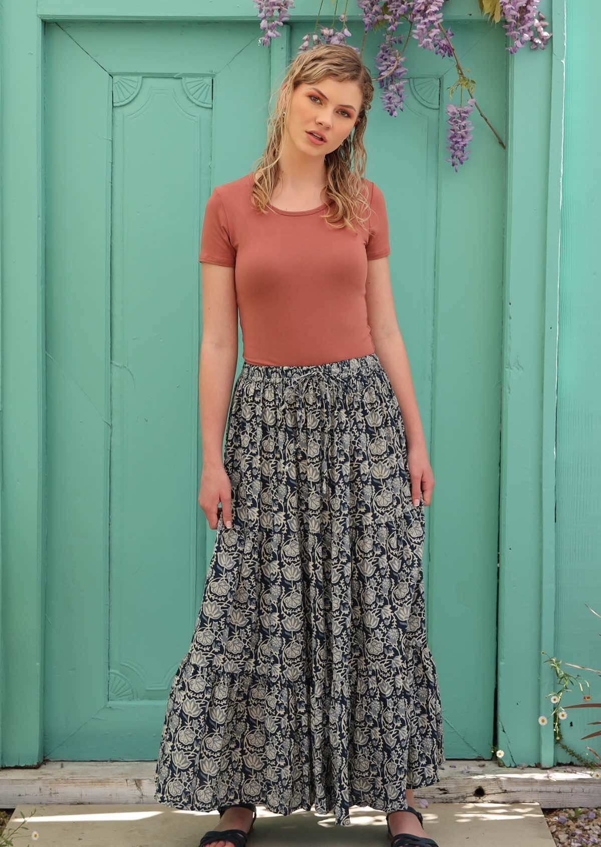 Model wears size s/m skirt paired with a short sleeve top. 