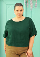 curve sized model wearing double cotton gauze green boxy blouse 
