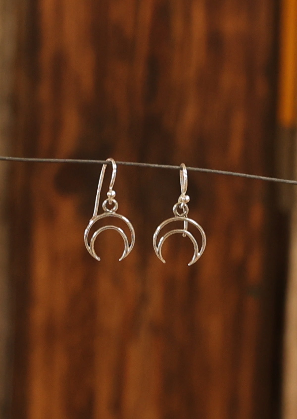 Hanging moon earrings store