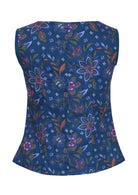Tailored cotton top  has colourful florals on a blue base. 